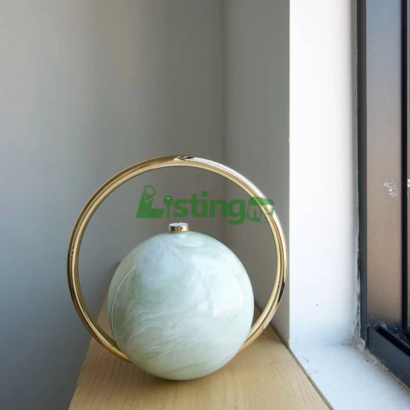 PREMIUM PLANET SHAPE PEARL CLUTCH – Stylish Handbag for Any Outfit