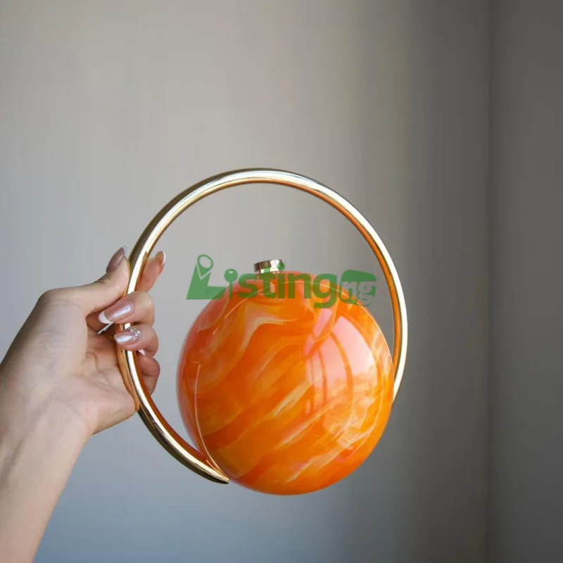 PREMIUM PLANET SHAPE PEARL CLUTCH – Stylish Handbag for Any Outfit